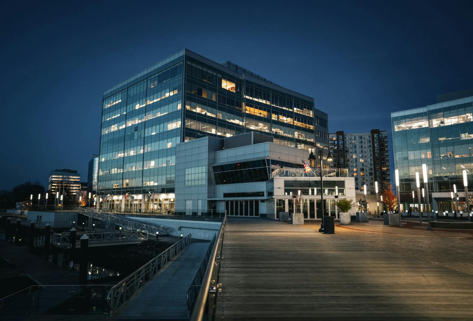 Modern glass office building at night