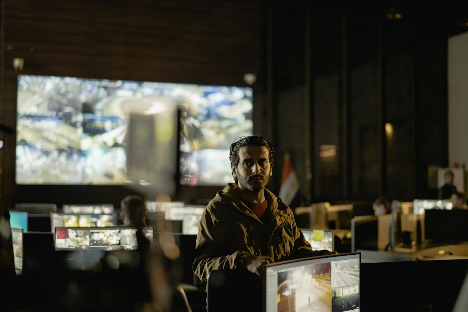 Security control room with live monitoring screens